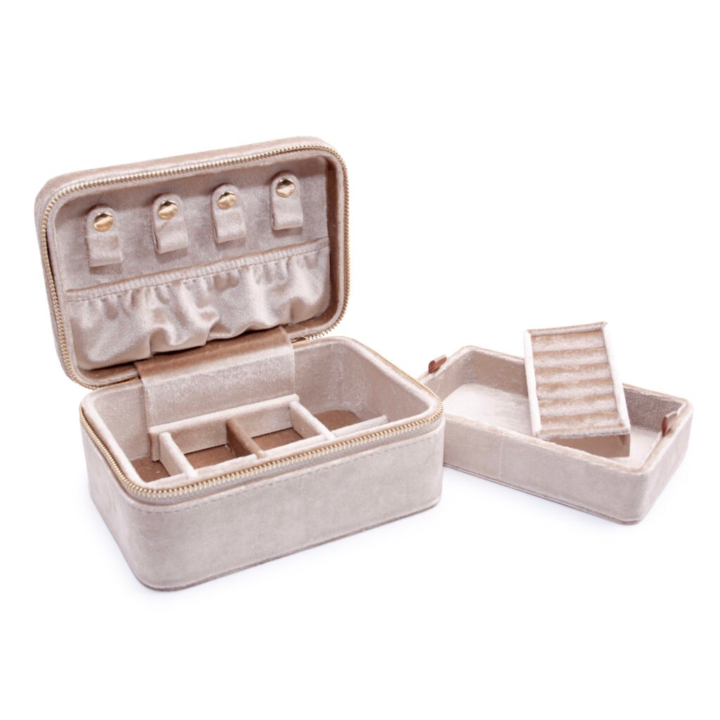 Open Cream velvet jewellery case with its divided upper tray lifted out.