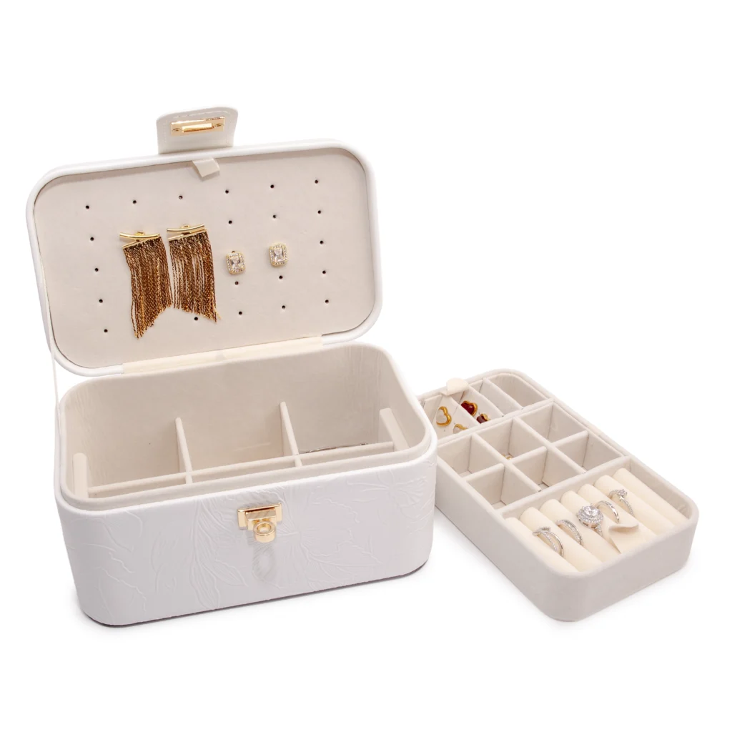 Open White floral jewellery case with its inner tray lifted out and placed beside it.